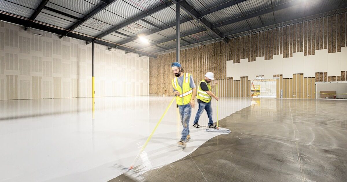 Modern warehouse structure with steel roofing and concrete floors